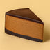 Slice of chocolate mousse cake on a beige background halo bagels harlem